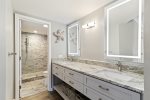 Ensuite master bath with double vanity and walk in shower